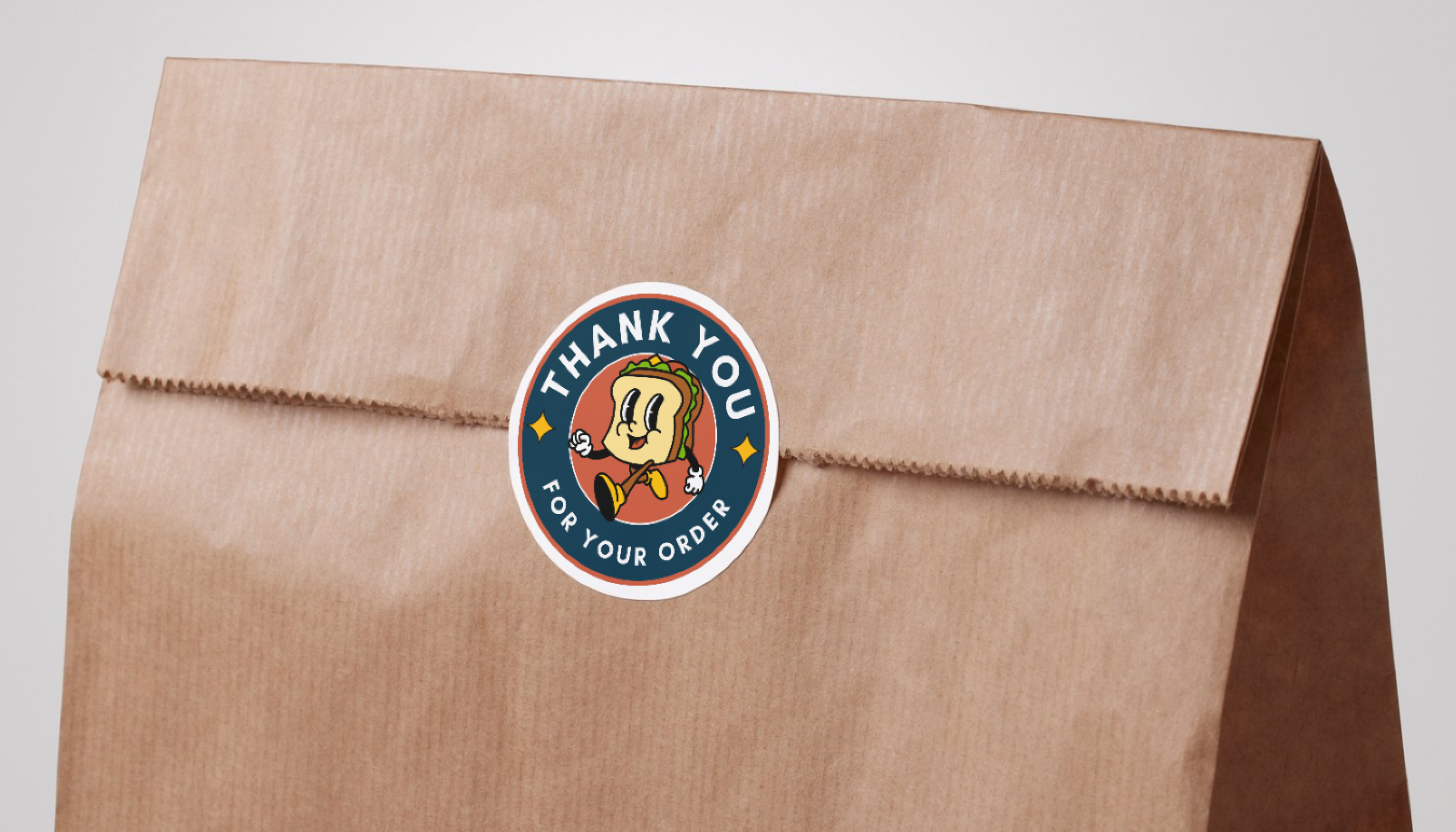 Crea sticker mockup su Canva Anteprima sticker mockup su busta di carta