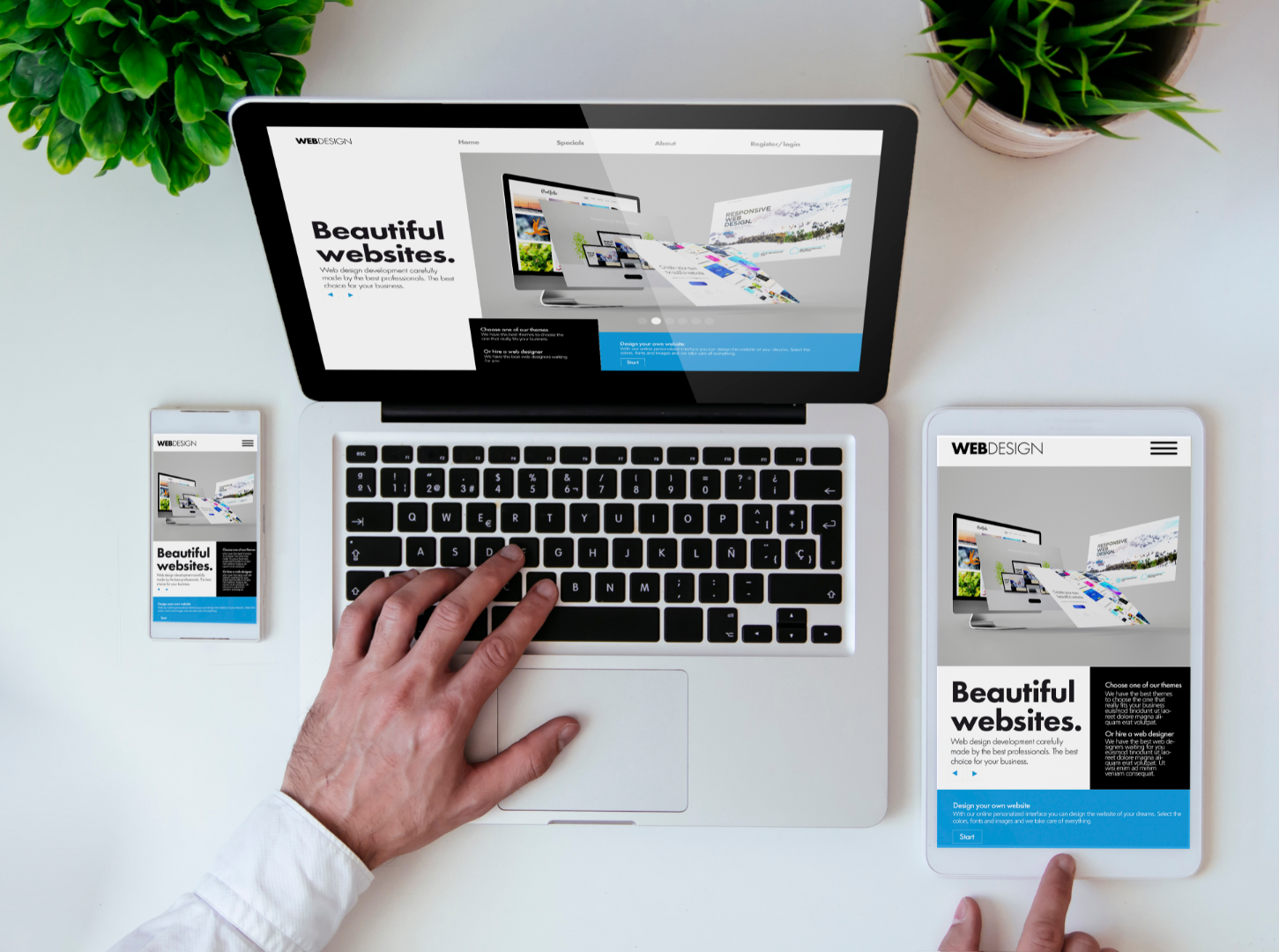 Responsive website design displayed across laptop, tablet and smartphone screens
