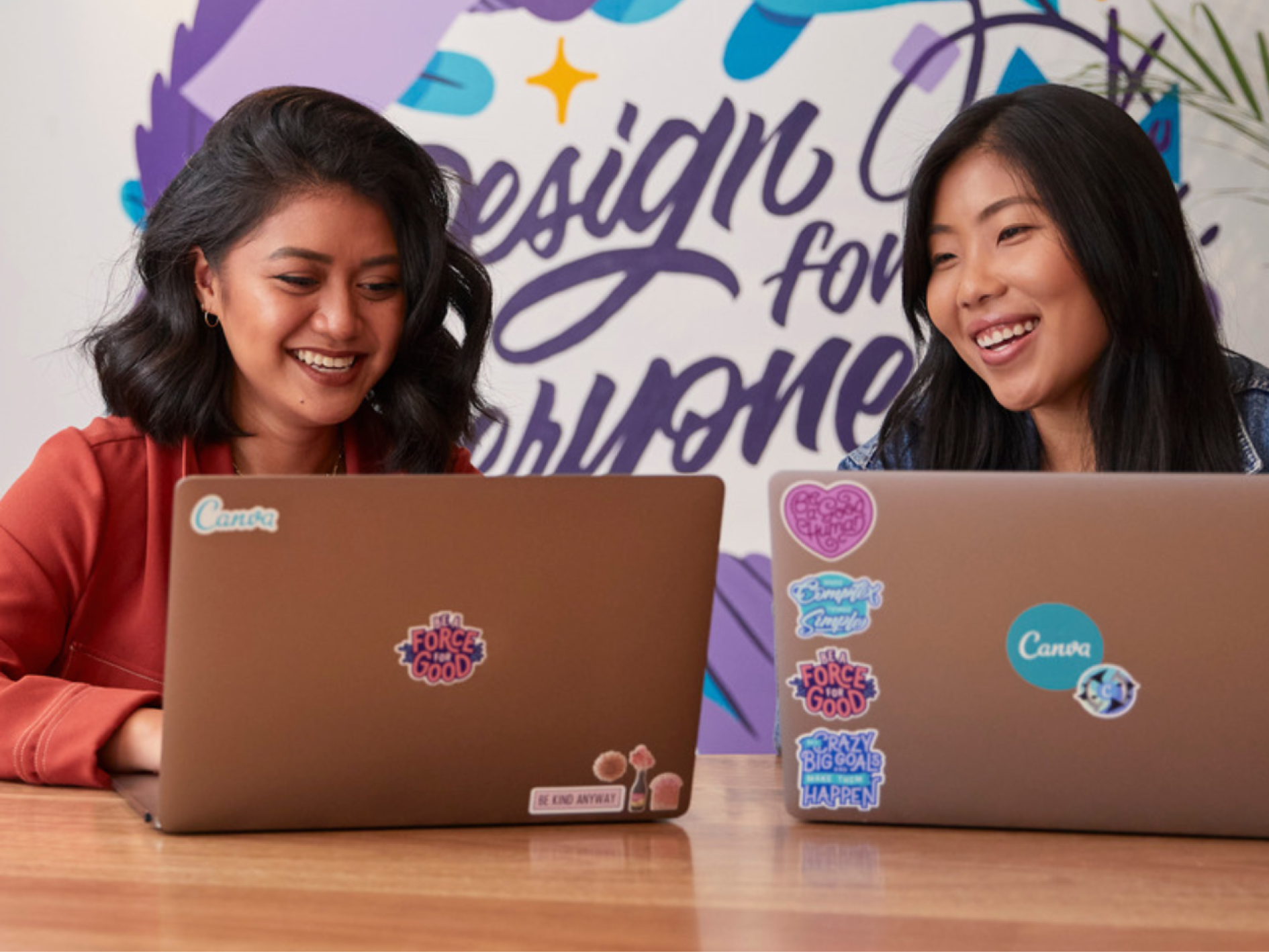 Two people on their laptops communicating with each other