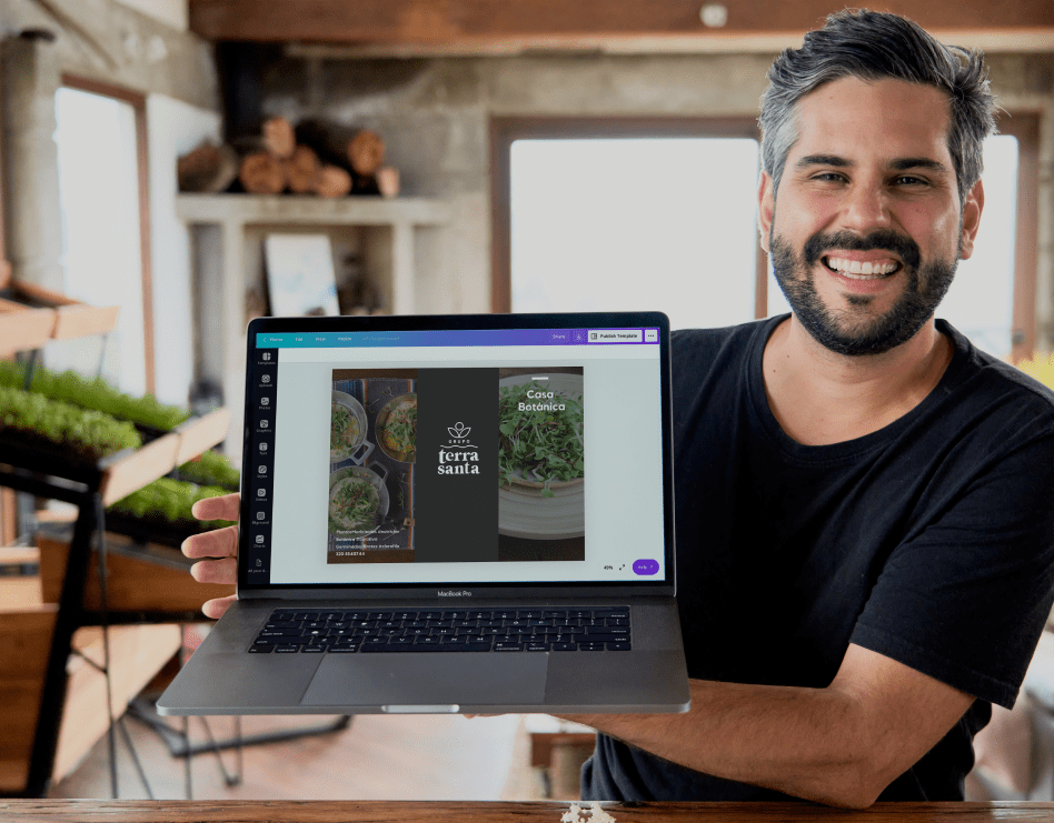 A person presenting a design they created with their laptop using Canva