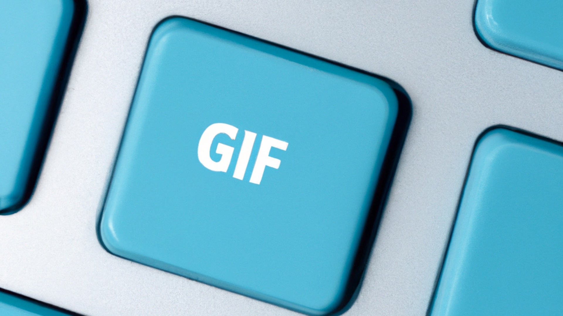 Vue de près d'un clavier bleu avec le mot GIF sur une touche pour créer des GIF