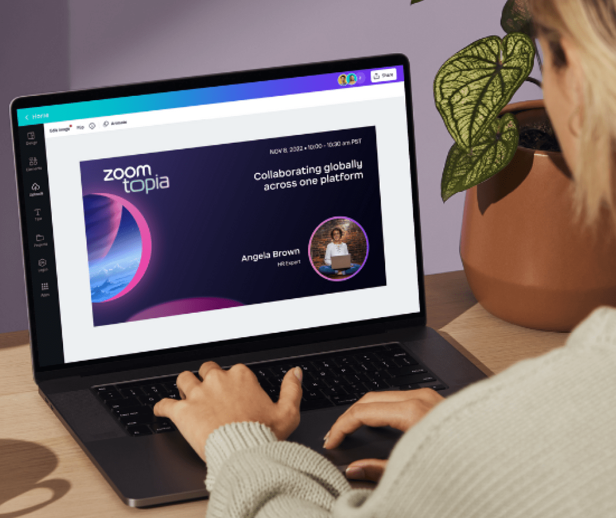 A person using Canva with their laptop