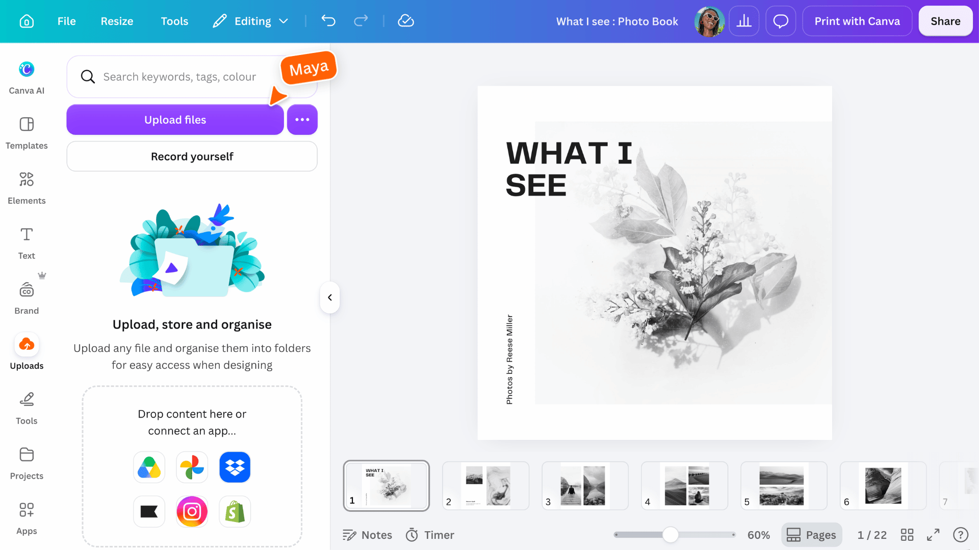 Canva Uploads panel beside a photo book design, showing options to upload files from a device or connected app.